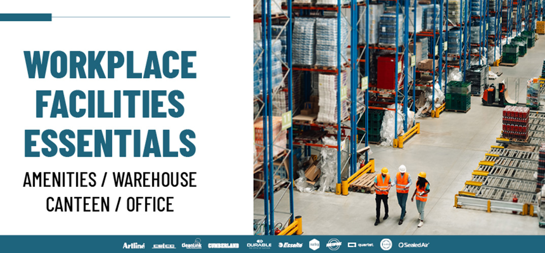 Two people walking in a warehouse